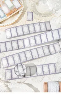 Detail view of vintage purple lace border washi tape for journaling and DIY crafts