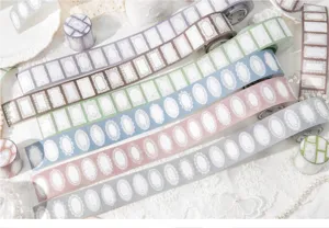 Collection of lace border decorative washi tape rolls in various pastel colors for DIY scrapbooking
