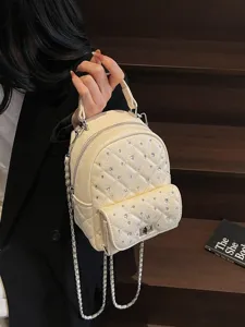 Trendy off-white quilted mini backpack with rhinestone detailing and chain strap