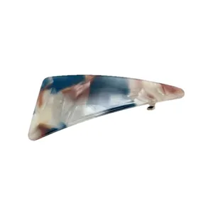 Elegant marble pattern resin spring hair clip with a geometric triangular design.