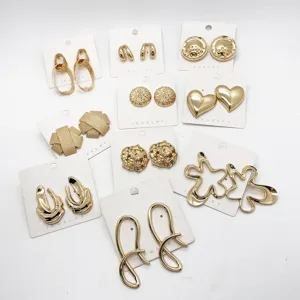 Collection of vintage gold geometric and heart-shaped alloy stud earrings for women