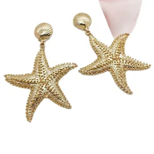 Gold starfish drop earrings with shell studs for women, ocean-themed accessories.