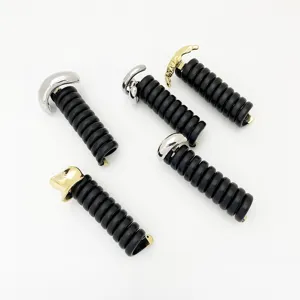 Detail view of black telephone cord hair rings with gold and silver metal clasps for hair