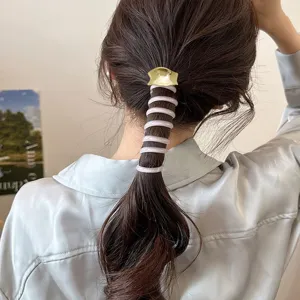 Detailed view of the high-end spiral hair tie used for bubble braid ponytail styling