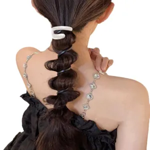 Back view detail of a silver metal phone wire hair tie for bubble braid hairstyles