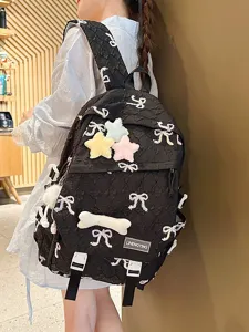 Linda mochila escolar acolchada negra con bordado de mariposa y amuletos de felpa