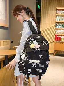 Linda mochila acolchada para niñas con bordado de lazos y accesorios de estrellas de peluche