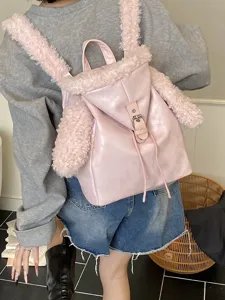 Elegante mochila rosa para mujer con lindas orejas de conejo y correas de piel sintética