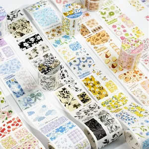 Floral and vintage fabric-style washi tape rolls for creative scrapbooking and journaling