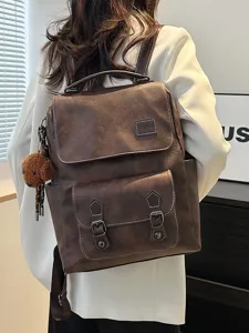 Zaino vintage in pelle PU marrone per donna con grande capacità e ciondolo a forma di orso