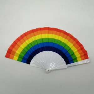 Rainbow folding fan detail view, featuring vibrant multi-color fabric and durable white plastic ribs.