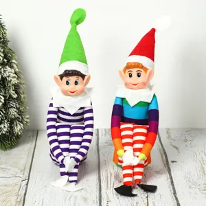 Christmas elf dolls detail shot, colorful plush toys showing long legs and cute pointed hats.