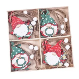 Christmas wooden gnome hanging ornaments set in a box, festive holiday tree decor.