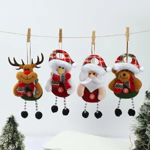 Detail shot of cute Christmas plush hanging ornaments set, featuring reindeer, snowman and Santa.