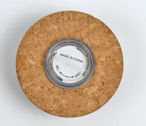 Replacement cork base for glass terrarium jar with integrated LED light switch bottom.