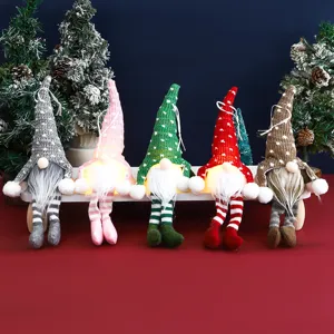 Pupazzo di peluche gnomo di natale con luce led gambe pendenti cappello lavorato