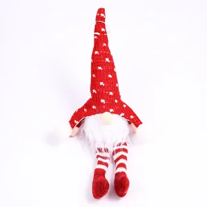 Peluche gnomo di Natale da appendere con cappello rosso e gambe a righe per decorazione.