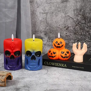Halloween glowing LED skull candles and pumpkin lights set for spooky party decorations.