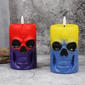 Halloween skull LED electronic candle detail view, colorful glowing holiday prop ornament.