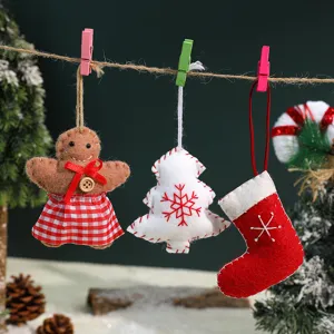 Felt Christmas hanging ornament detail, featuring cute gingerbread man, tree, and sock.