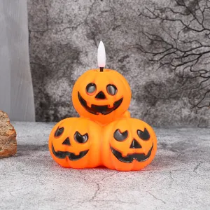Halloween LED pumpkin light ornament, funny glowing jack-o-lantern for spooky party deco.