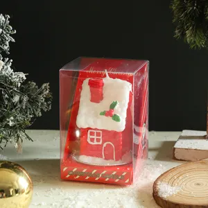 Christmas house shaped scented candle in clear box holiday decor gift item detail view