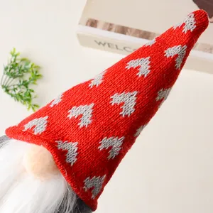 Christmas gnome faceless doll plush toy detail view featuring red knit heart pattern hat.