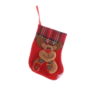 Christmas plush stocking gift bag with cute reindeer and plaid cuff for holiday decor.