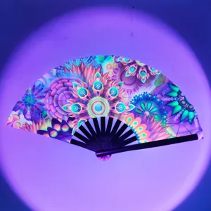 UV fluorescent folding hand fan with vibrant mandala floral pattern and black ribs for festival.