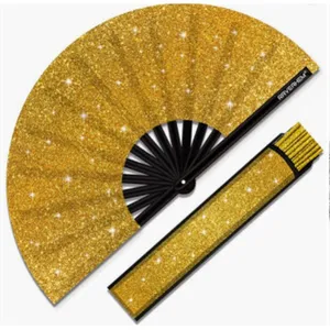 Gold glitter folding fan 10 inch rave kung fu fan with black bamboo ribs and pouch detail