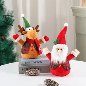 Detailed view of cute Christmas plush toys, featuring a reindeer and Santa Claus with knitted hats.