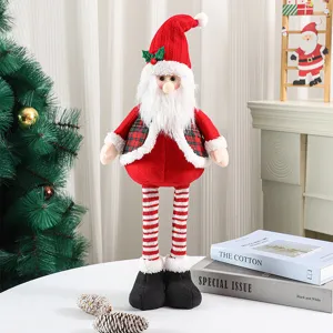 Detailed view of Christmas plush Santa doll decoration with knitted hat and striped legs.