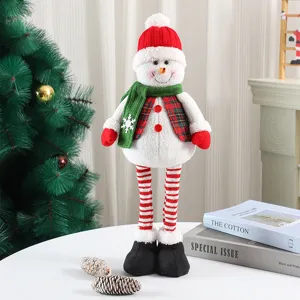 Detailed view of cute Christmas snowman plush doll ornament with knitted hat and scarf.