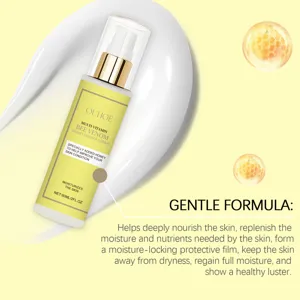 Close-up detail of OUHOE honey essence lotion showing texture and nourishing formula.