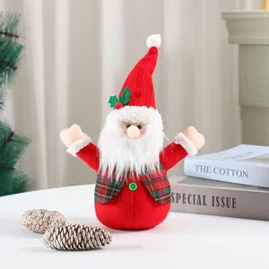 Christmas gnome doll detail shot, fabric plush Santa ornament with plaid vest for holiday decor.