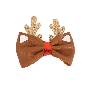Charmante pince à cheveux nœud bois de renne de Noël, accessoire de fête pailleté.