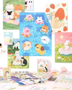 Detailoverzicht van 28 stuks schattige dierenstickers en creatief scrapbooking papier.