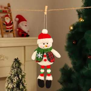 Cute Christmas fabric snowman hanging ornament for holiday tree decoration detail.