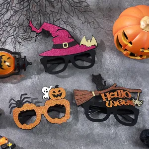 Halloween party glasses detail close-up, glitter witch hat pumpkin spider novelty eyewear props.
