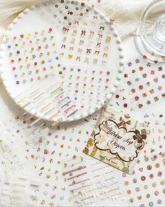 Gedetailleerd overzicht van Mo-Card Retro Soft Objects stickers met strikken en bloemen