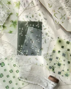 Translucent floral vellum paper sheets with botanical patterns for scrapbooking