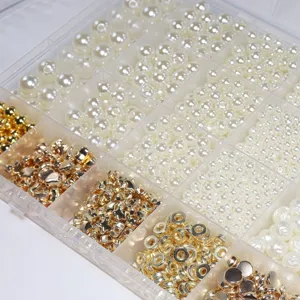 24-grid DIY jewelry bead set featuring white imitation pearls and golden metal charms