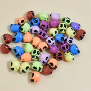 Close-up of mixed color 10-13mm skull acrylic beads for DIY jewelry and accessory making