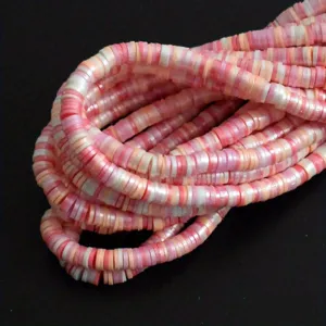 Vue détaillée de perles Heishi de 6 mm en pâte polymère colorée pour la création de bijoux