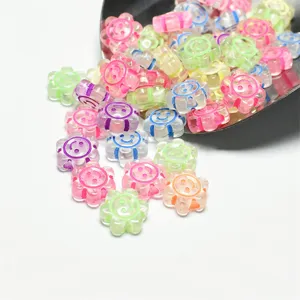 Detalle de cuentas de acrílico de 10mm con cara sonriente y girasol para bisutería DIY.
