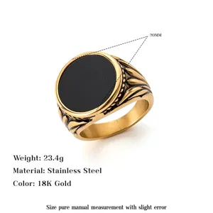 Vintage gold stainless steel ring detail showing black inlay, 20mm diameter, and weight.