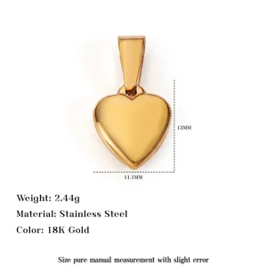 Detailed macro view of 18K gold plated stainless steel heart pendant with measurements