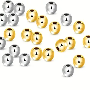 Cuentas espaciadoras redondas de metal en oro y plata para la creación de joyas DIY