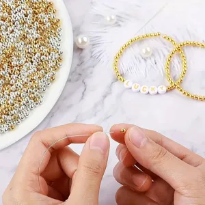 Cuentas espaciadoras de metal redondas en oro y plata para hacer joyas y pulseras DIY