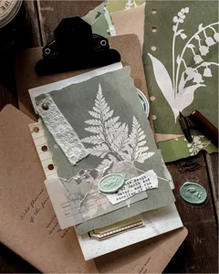 Detailed macro view of vintage botanical silhouette paper for journaling decoration